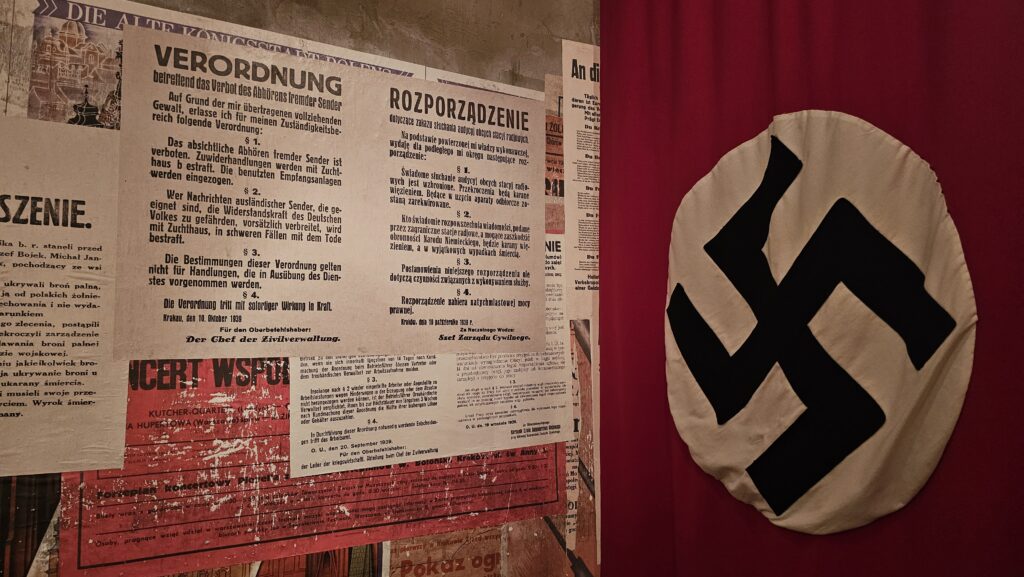 Reconstructed street scene of Nazi-occupied Kraków, allowing visitors to walk through a realistic wartime environment.